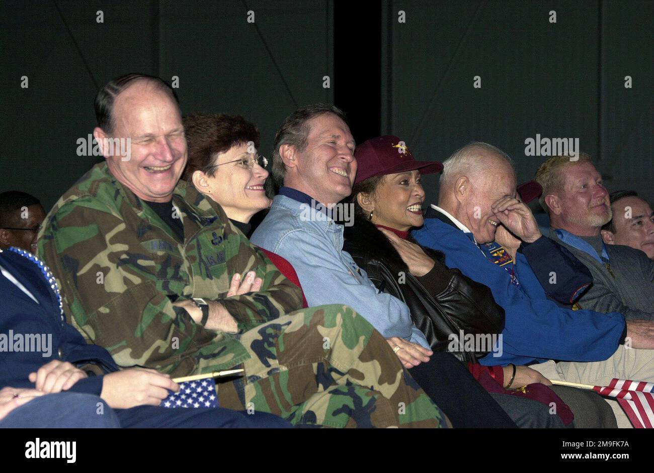 (from left to right) US Air Force General Gregory S. Martin, Commander, US Air Forces in Europe, Mrs. Wendy Martin, Secretary of Defense William S. Cohen, Mrs Janet Langhart Cohen, Senator John Glenn, Mrs Anne Glenn and Medal of Honor Recipient Mr. Sammy Davis enjoy the Secretary of Defense's Holiday Show 2000 at Ramstein Air Base, Germany on December 17, 2000. Base: Ramstein Air Base State: Rheinland-Pfalz Country: Deutschland / Germany (DEU) Stock Photo