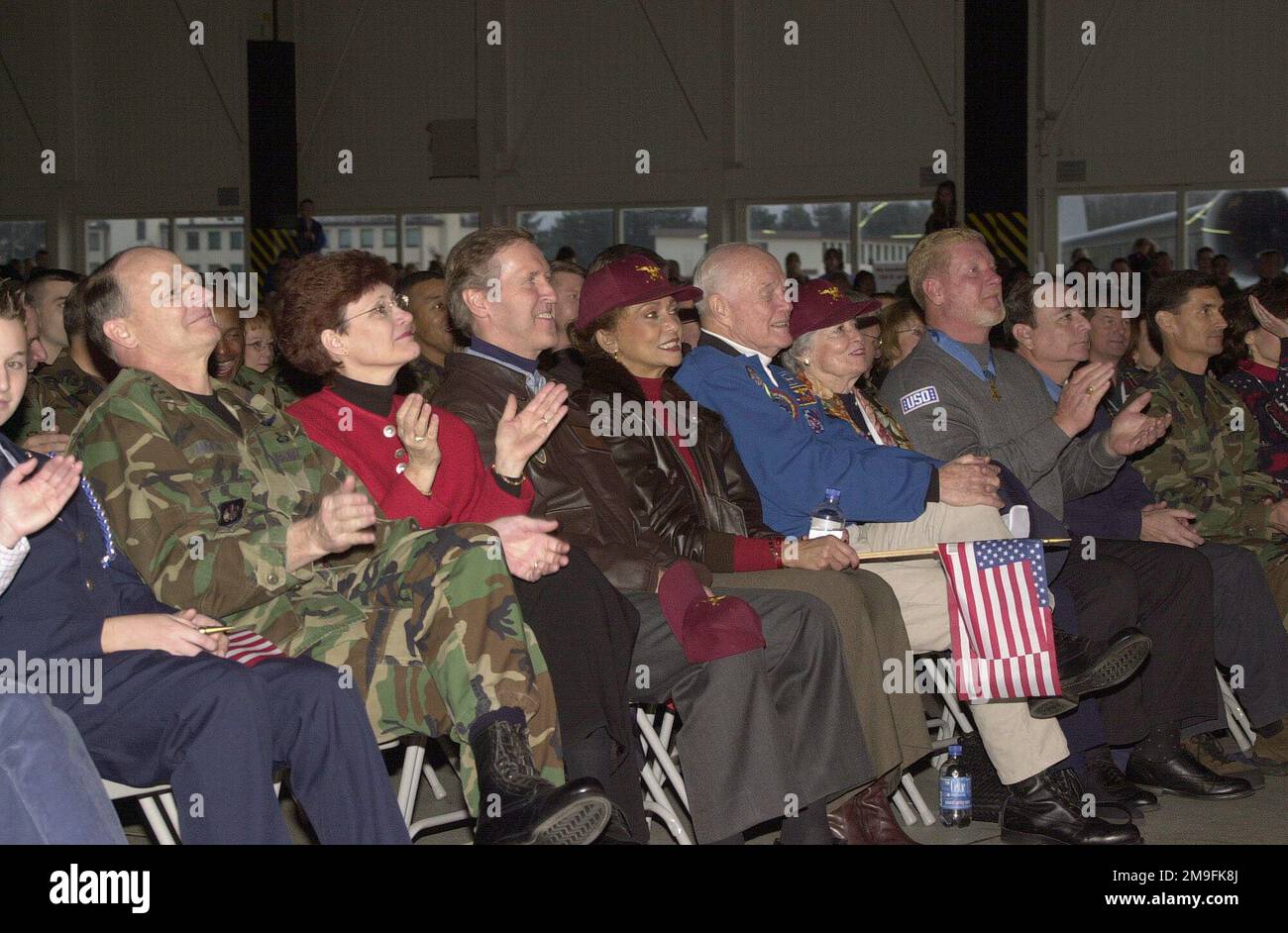 (from left to right) US Air Force General Gregory S. Martin, Commander, US Air Forces in Europe, Mrs. Wendy Martin, Secretary of Defense William S. Cohen, Mrs Janet Langhart Cohen, Senator John Glenn, Mrs Anne Glenn and Medal of Honor Recipient Mr. Sammy Davis enjoy the Secretary of Defense's Holiday Show 2000 at Ramstein Air Base, Germany on December 17, 2000. Base: Ramstein Air Base State: Rheinland-Pfalz Country: Deutschland / Germany (DEU) Stock Photo