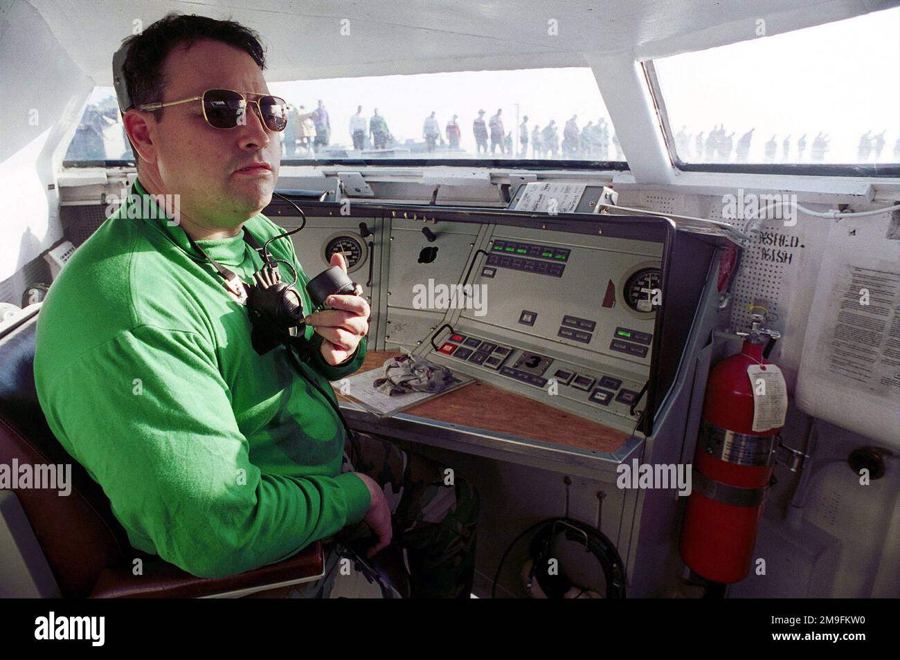 US Navy Aviation Boatswain's Mate First Class Luis J. Torres, the waist