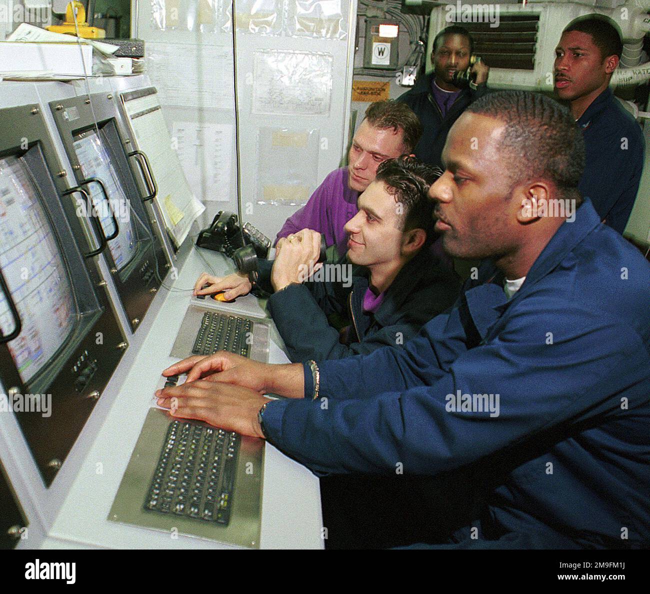 Bai Conrep US Navy Aviation Boatswains Mates Fuels personnel monitor the liquid ...