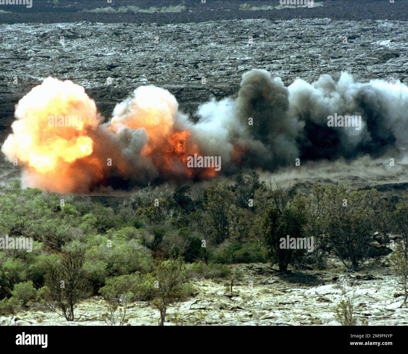 A rocket with a line of C-4 attached known as a line charge explodes ...