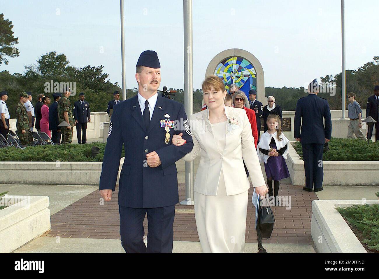 US Air Force MASTER Sergeant Mark Norris and his wife leave the award ceremony where MSGT Norris received the highest peacetime Air Force award, the Airmans Medal, at the Veterans Memorial Eglin Air Force Base, Florida. Base: Eglin Air Force Base State: Florida (FL) Country: United States Of America (USA) Stock Photo