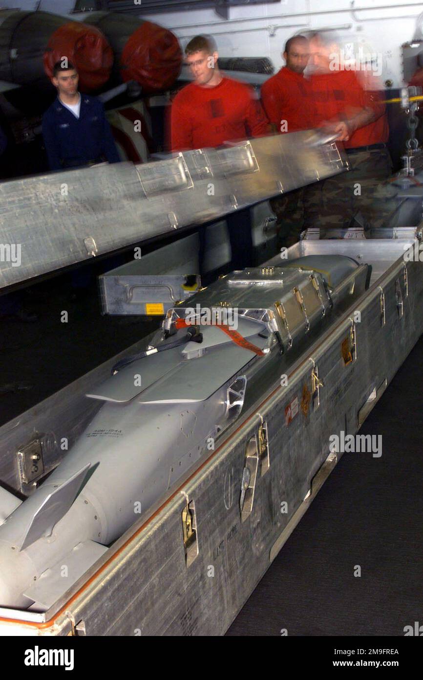 Aviation ordnancemen inspect a joint stand off weapon jsow in the