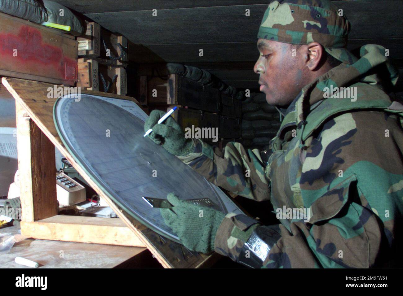 US Air Force AIRMAN First Class Jamar Vick, 51st Security Forces Squadron, double checks range-markers for a possible mortar fire mission, during the 2001 Operational Readiness Inspection (ORI) at Osan Air Base, Republic of Korea. Base: Osan Air Base Country: Republic Of Korea (KOR) Stock Photo