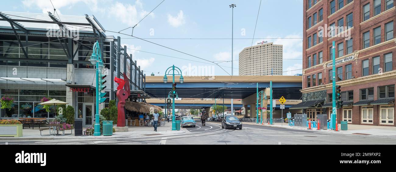 City intersection with overpass in background, Milwaukee, Wisconsin, USA Stock Photo