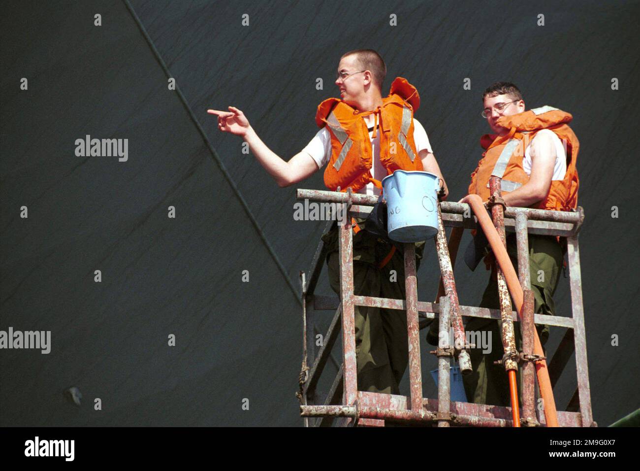 US Navy SEAMAN Dustin Stevens and US Navy SEAMAN John Sievert prepare ...
