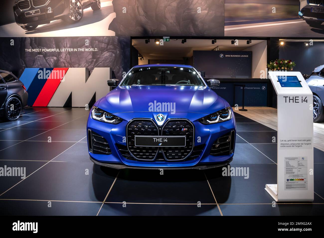BMW i4 (G26) all-electric Gran Coupe car at the Brussels Autosalon European Motor Show. Brussels, Belgium - January 13, 2023. Stock Photo
