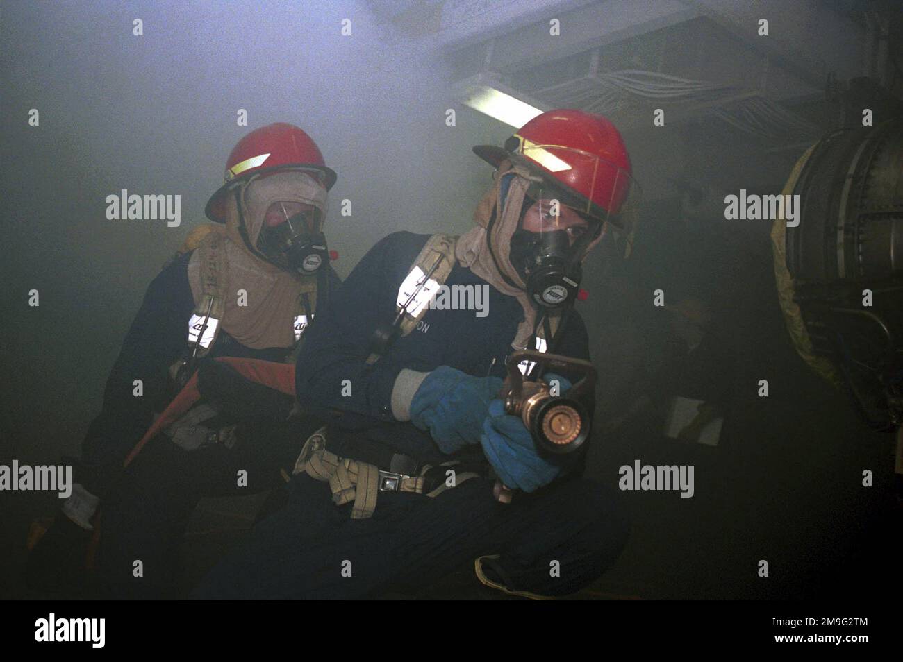 US Navy Aircrew Survival Equipmentman Third Class Jason Longmore and US ...