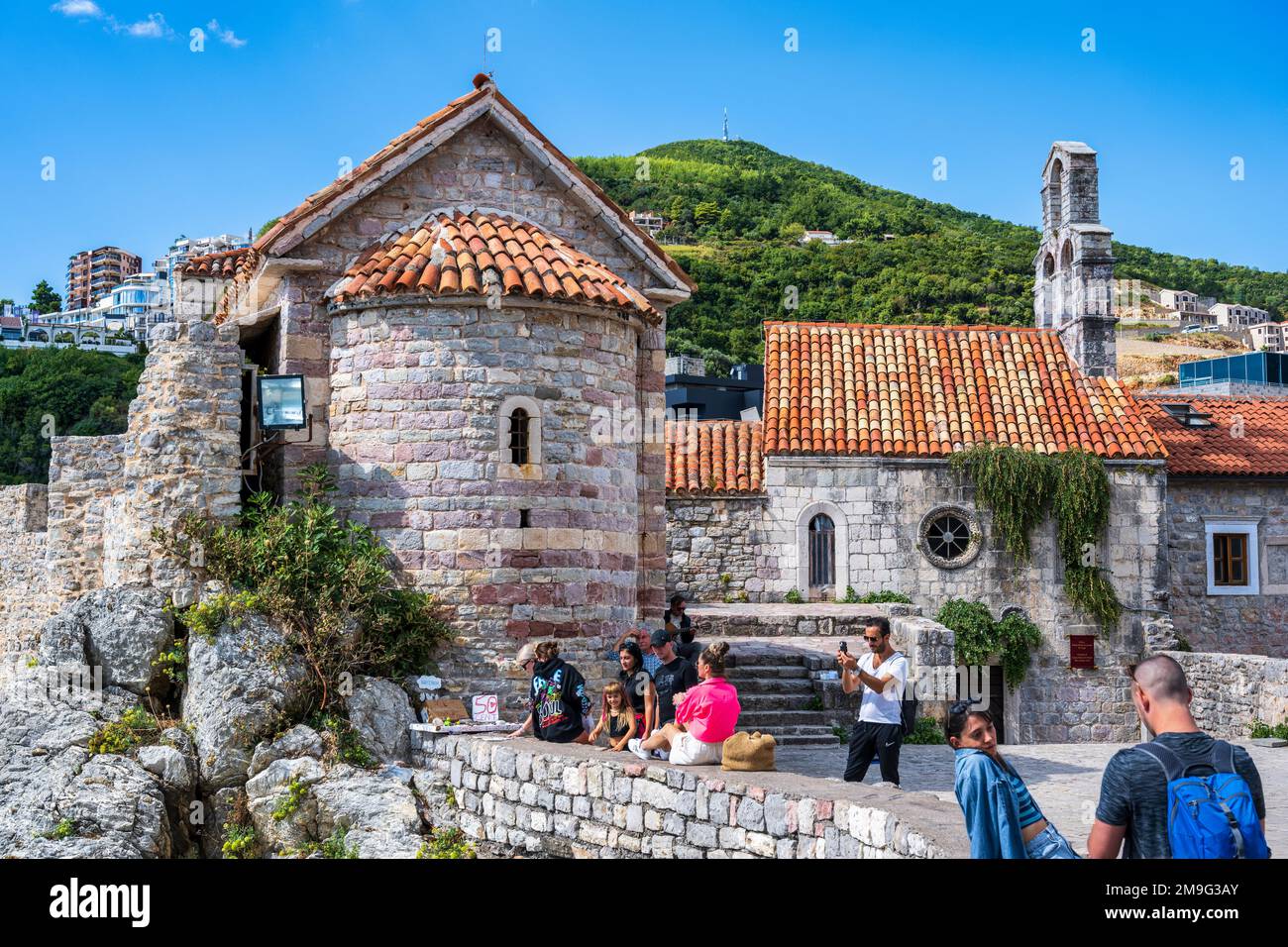 Church of St. Sabba the Sanctified, with Santa Maria in Punta Church on the right, in the old town of Budva on the Adriatic Coast of Montenegro Stock Photo