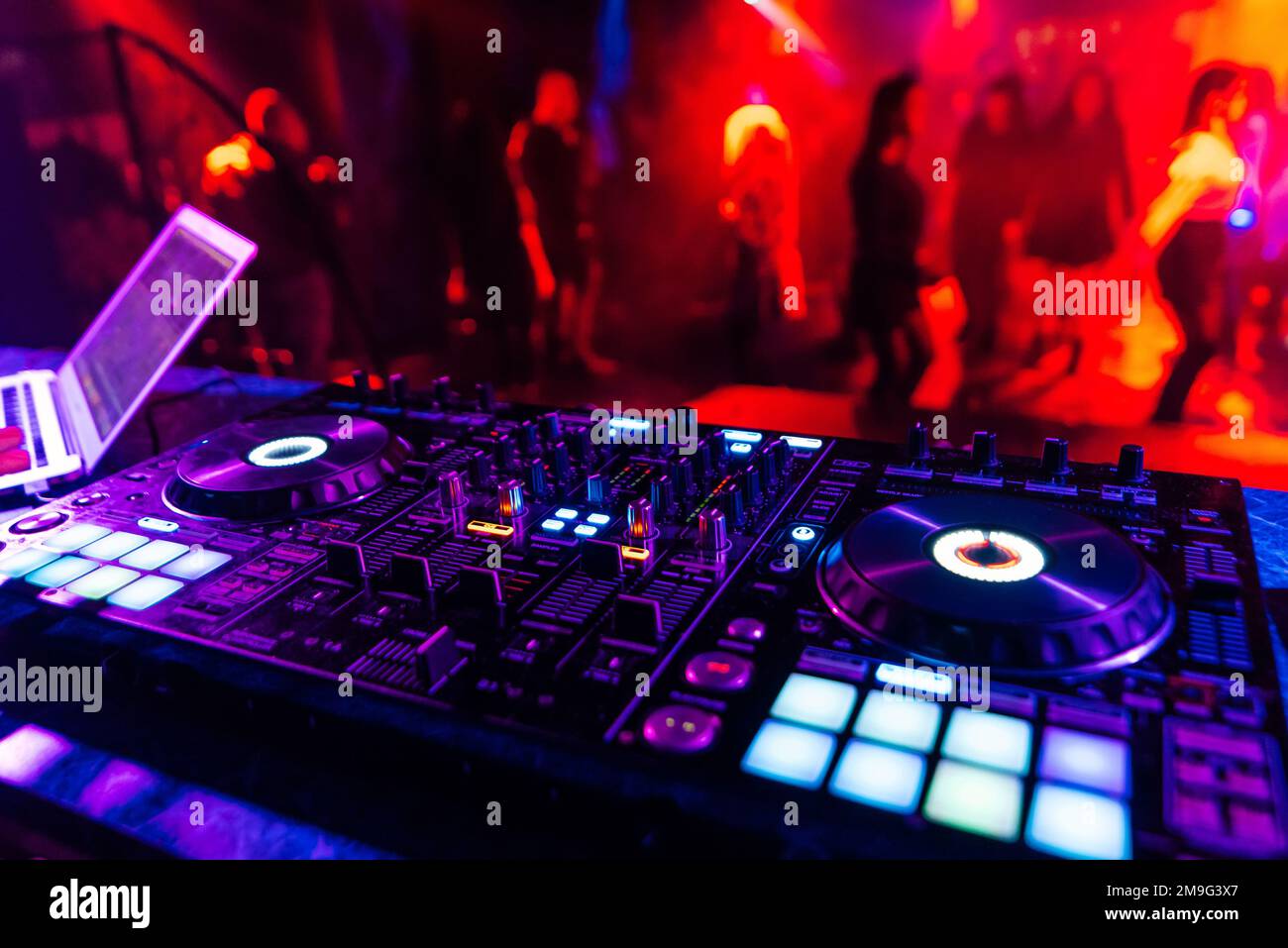 professional DJ mixer controller for mixing music in a with