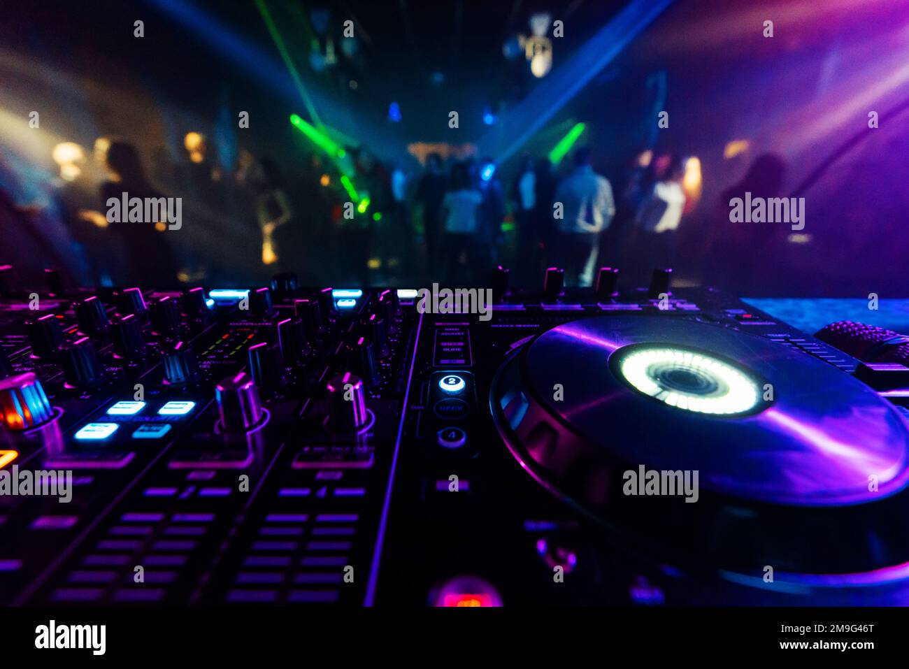 professional DJ mixer controller for mixing music in a with
