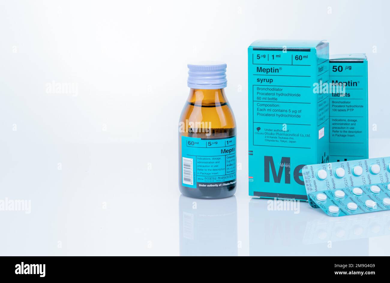CHONBURI, THAILAND-SEPTEMBER 23, 2022: Meptin syrup in bottle and Meptin tablets in blister pack with paper box packaging. Procaterol hydrochloride. Stock Photo