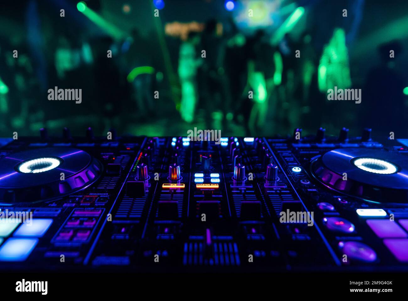 professional DJ mixer controller for mixing music in a with