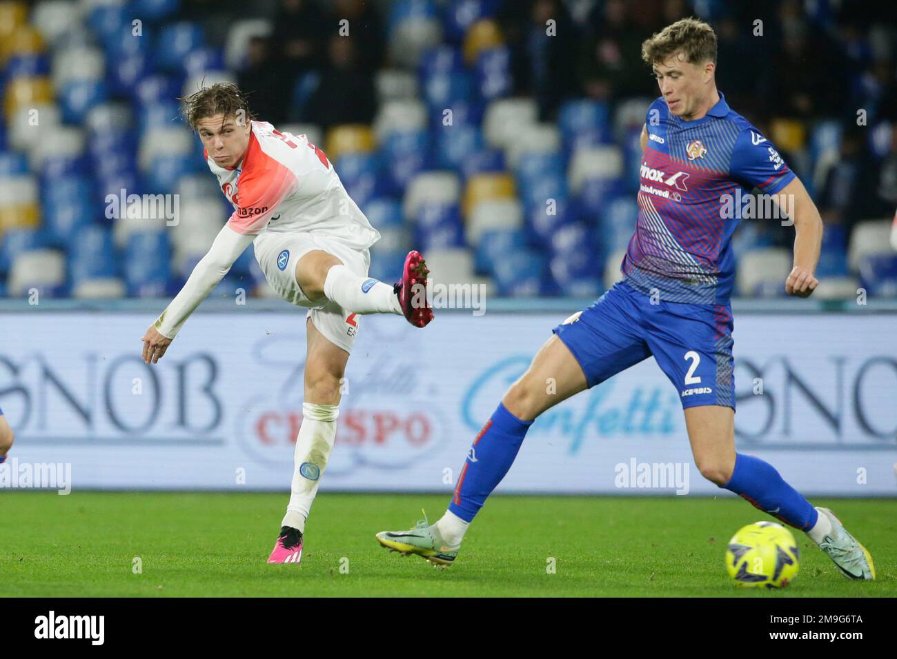 SSC NapoliÕs Italian forward Alessio Zerbin challenges for the ball with Cremonese Scottish defender Jack Hendry during the Italy cup football match between SSC Napoli and Cremonese at the Diego Armando Maradona Stadium in Naples, southern Italy, on January 17, 2023. Stock Photo
