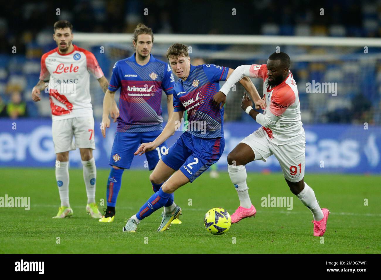 Cremonese Scottish defender Jack Hendry challenges for the ball with SSC Napoli French midfielder Tanguy Ndombele during the Italy cup football match between SSC Napoli and Cremonese at the Diego Armando Maradona Stadium in Naples, southern Italy, on January 17, 2023. Stock Photo