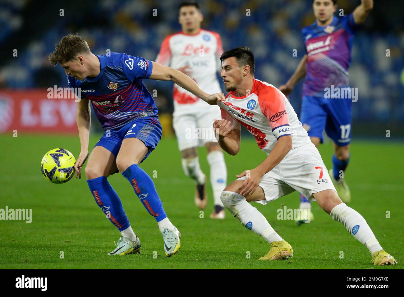 Cremonese Scottish defender Jack Hendry challenges for the ball with SSC Napoli's Macedonian midfielder Eljif Elmas  during the Italy cup football match between SSC Napoli and Cremonese at the Diego Armando Maradona Stadium in Naples, southern Italy, on January 17, 2023. Stock Photo