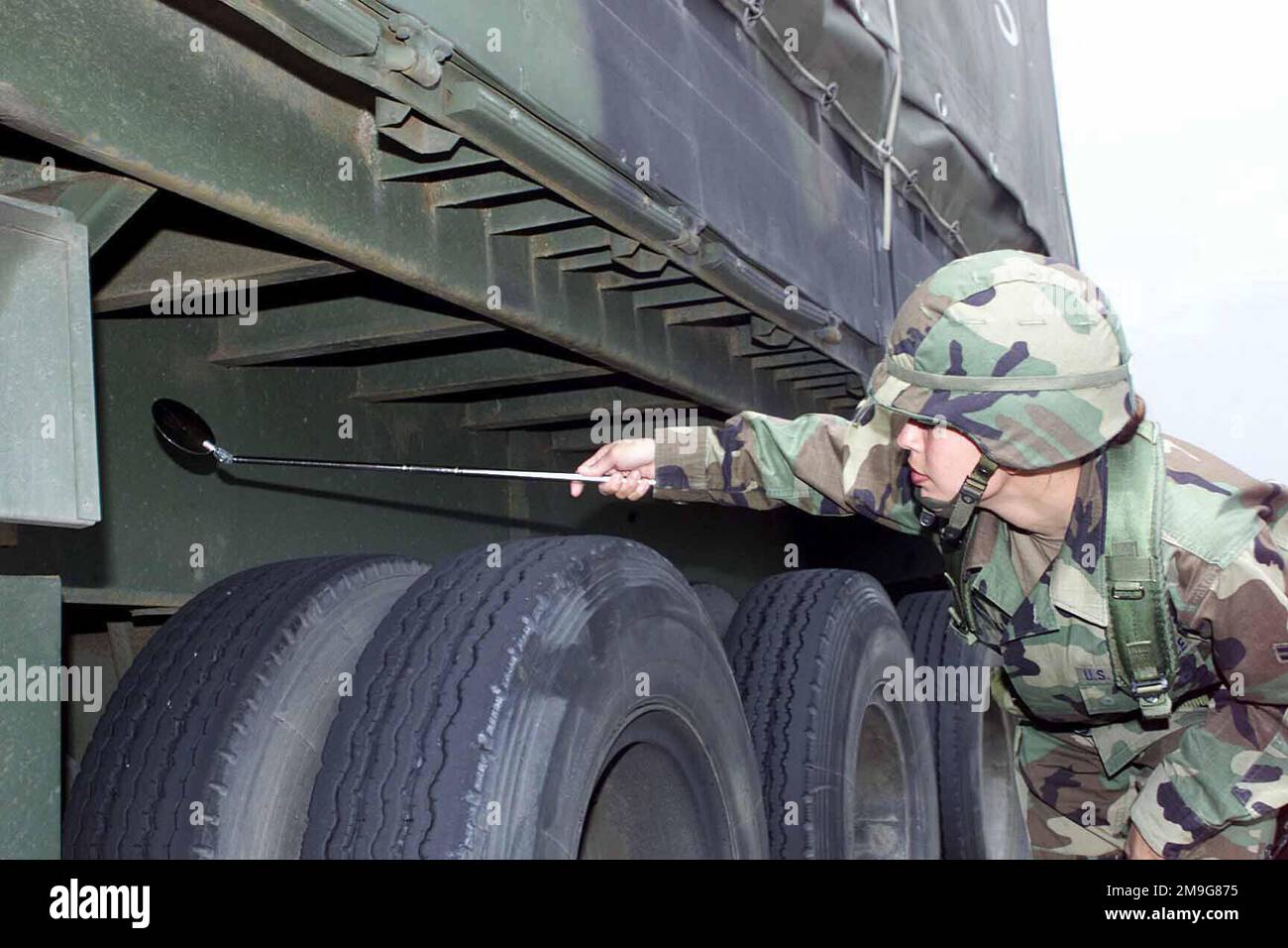 US Air Force AIRMAN First Class Laura Denis, 52nd Security Forces Squadron, inspects a vehicle before it enters the main gate during a Phase II Local Salty Nation exercise at Spangdahlem Air Base, Germany. Base: Spangdahlem Air Base State: Rheinland-Pfalz Country: Deutschland / Germany (DEU) Stock Photo