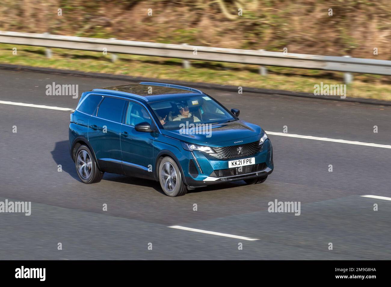 2021 Blue PEUGEOT 5008 GT BLUEHDI S/S 1500cc 6 speed manual; travelling on the M61 motorway, UK Stock Photo