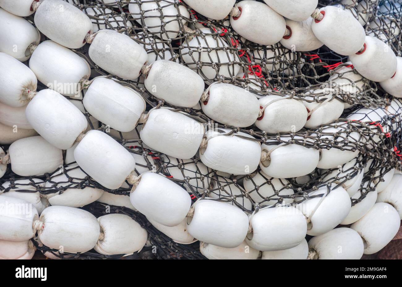 Trawler fishing net and floats stored on air Stock Photo Alamy