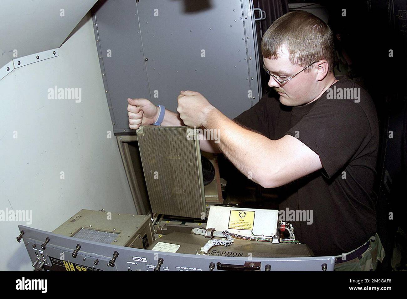 SENIOR AIRMAN Brandon Smith, an Electronic Computer and Switching