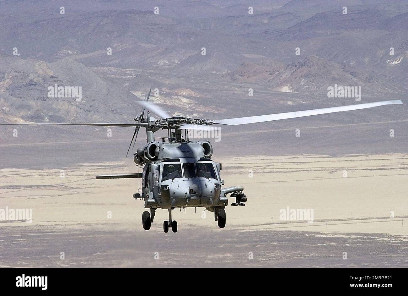 An HH-60H SEAHAWK helicopter heads back to home station after ...