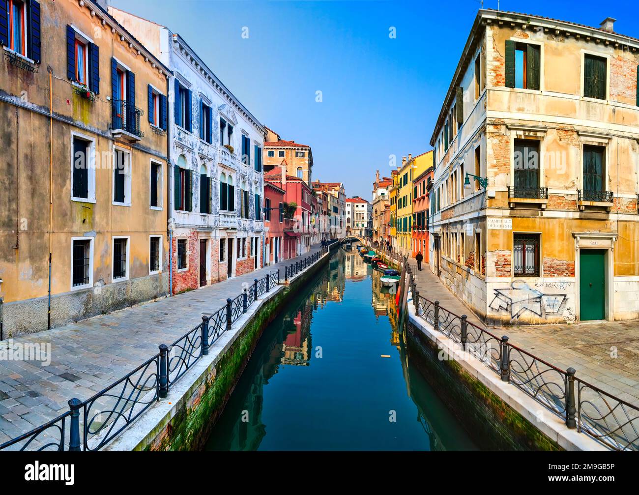 Water canal between buildings, Venice, Italy Stock Photo