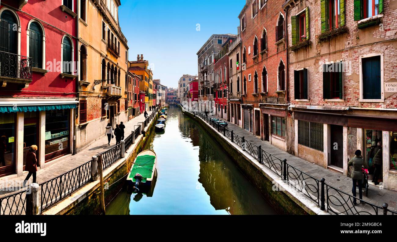 Water canal between buildings, Venice, Italy Stock Photo