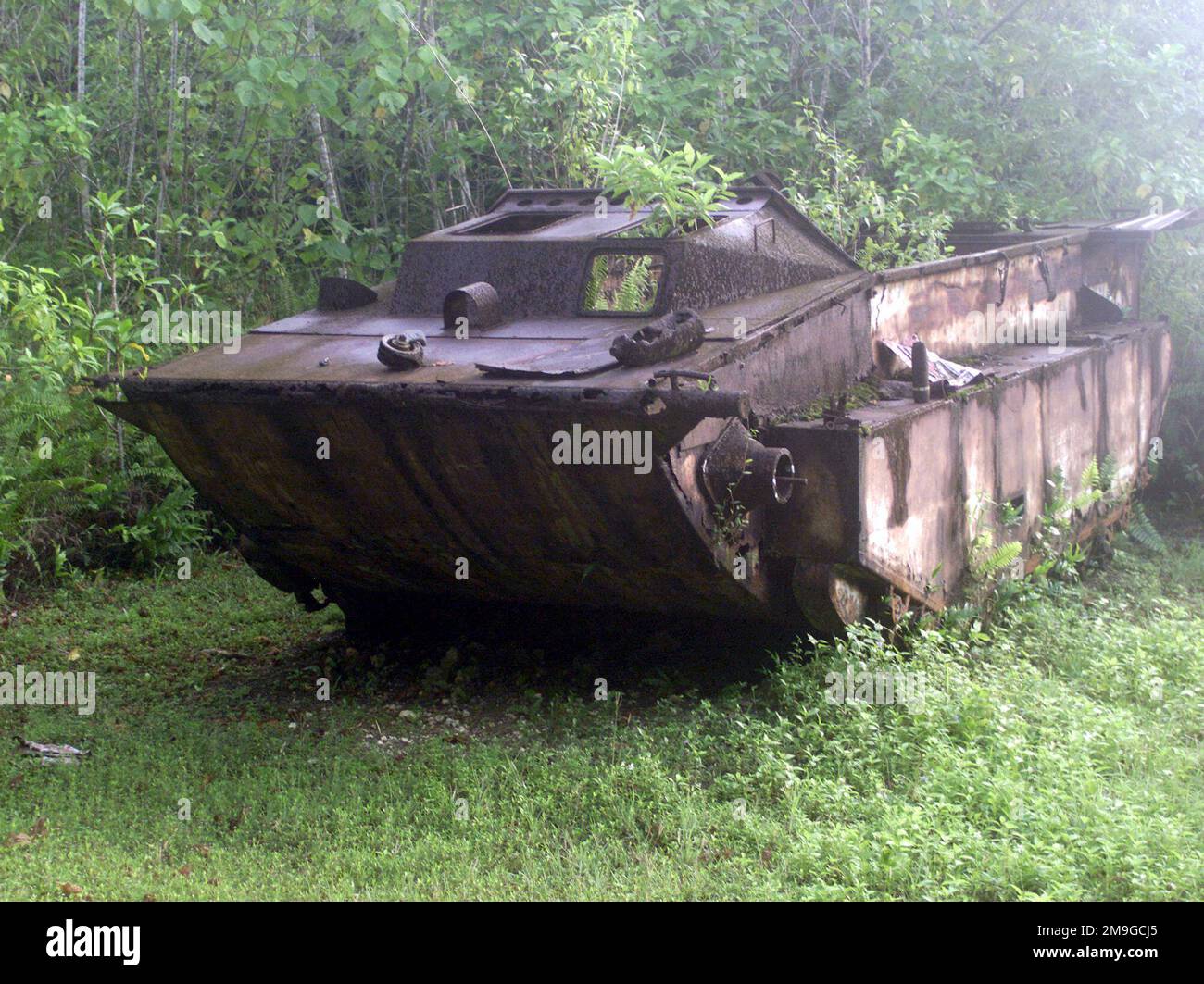 A Landing Vehicle Tracked (Mark II), LVT-2 that was left after the Battle of Peleliu during World War Two on the island of Peleliu. Photograph taken as part of Exercise KOA THUNDER 2001. Marines from Aviation Support Element, Kaneohe Bay, Hawaii, 1ST Marine Air Wing, Okinawa, Japan, and 3rd Marines 7th Battalion 29 Palms, California, participated in KOA THUNDER on the island of Guam from July 9 to July 14. The purpose of the exercise was to demonstrate the Marine Corps ability to deploy in the South Pacific from places other than Okinawa, Japan. Subject Operation/Series: KOA THUNDER 2001 Base: Stock Photo