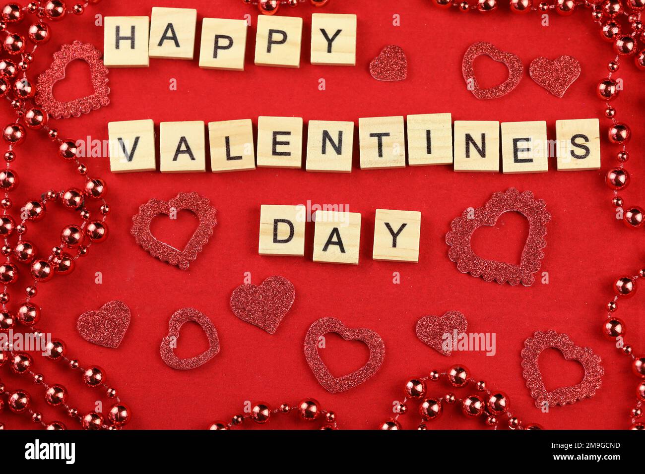 Valentines Day card. red hearts on a red background with text Happy ...