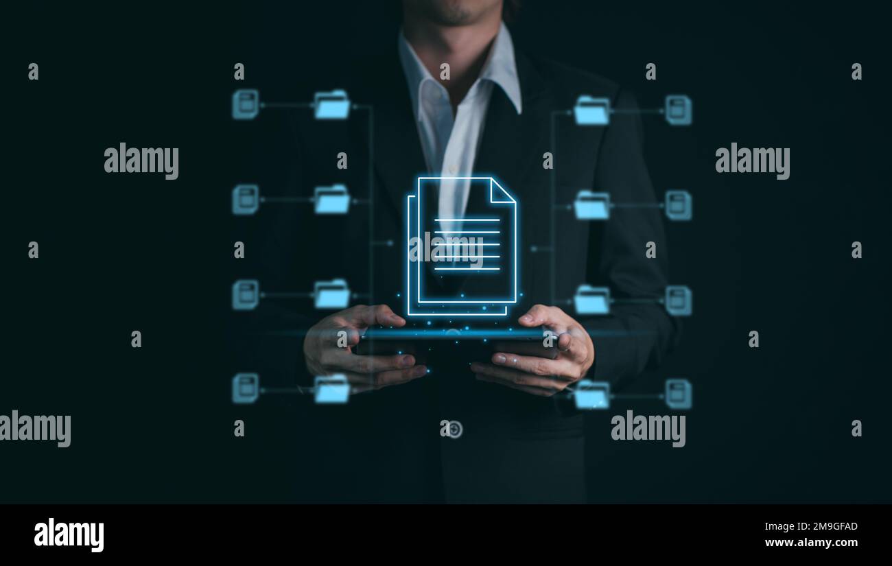 Document Management System (DMS). Digital online document database and paperless  office. Businessman hand hold tablet with folder process automation t Stock  Photo - Alamy
