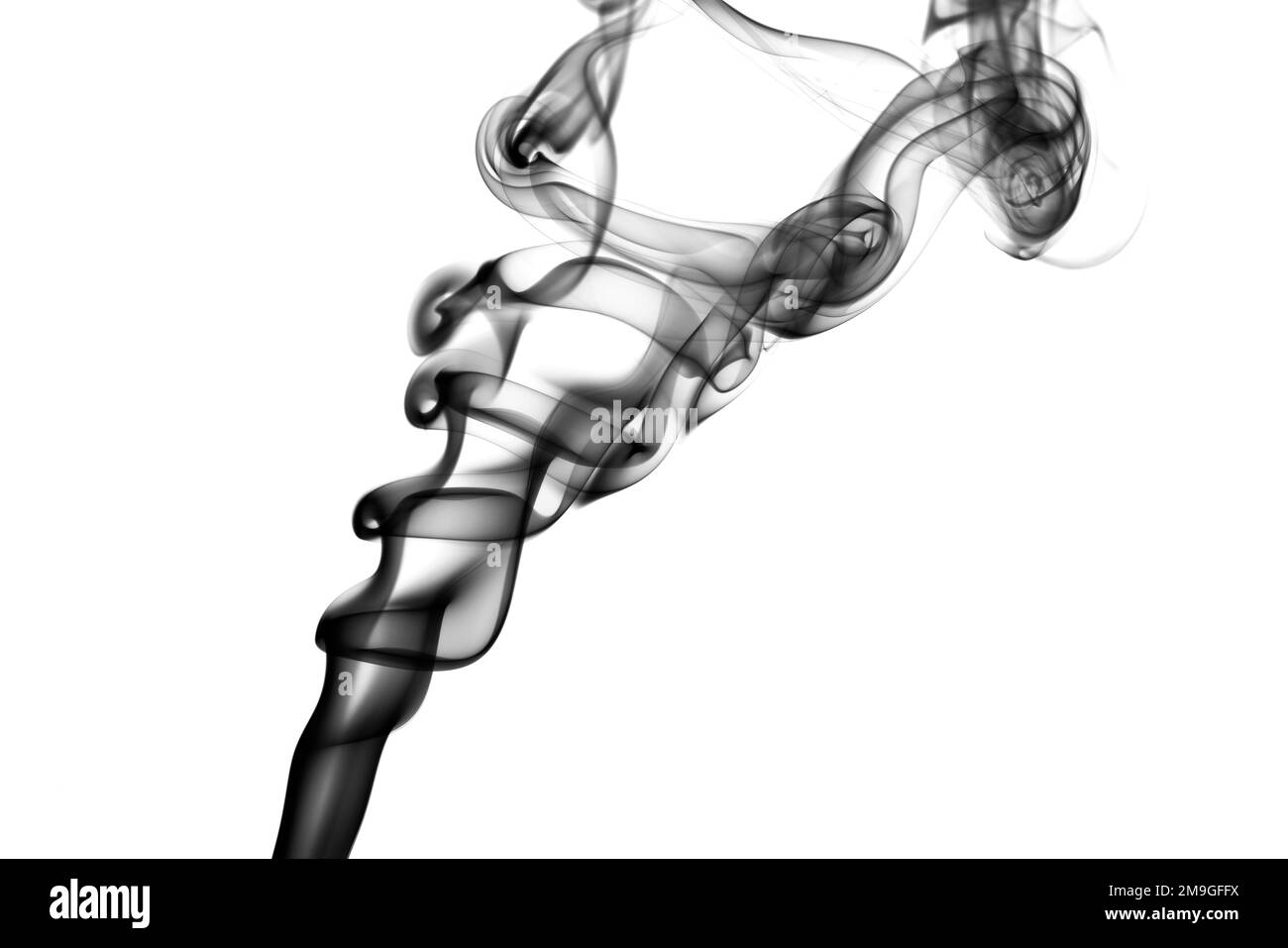 Artistic looking smoke swirls photographed against a plain white background Stock Photo