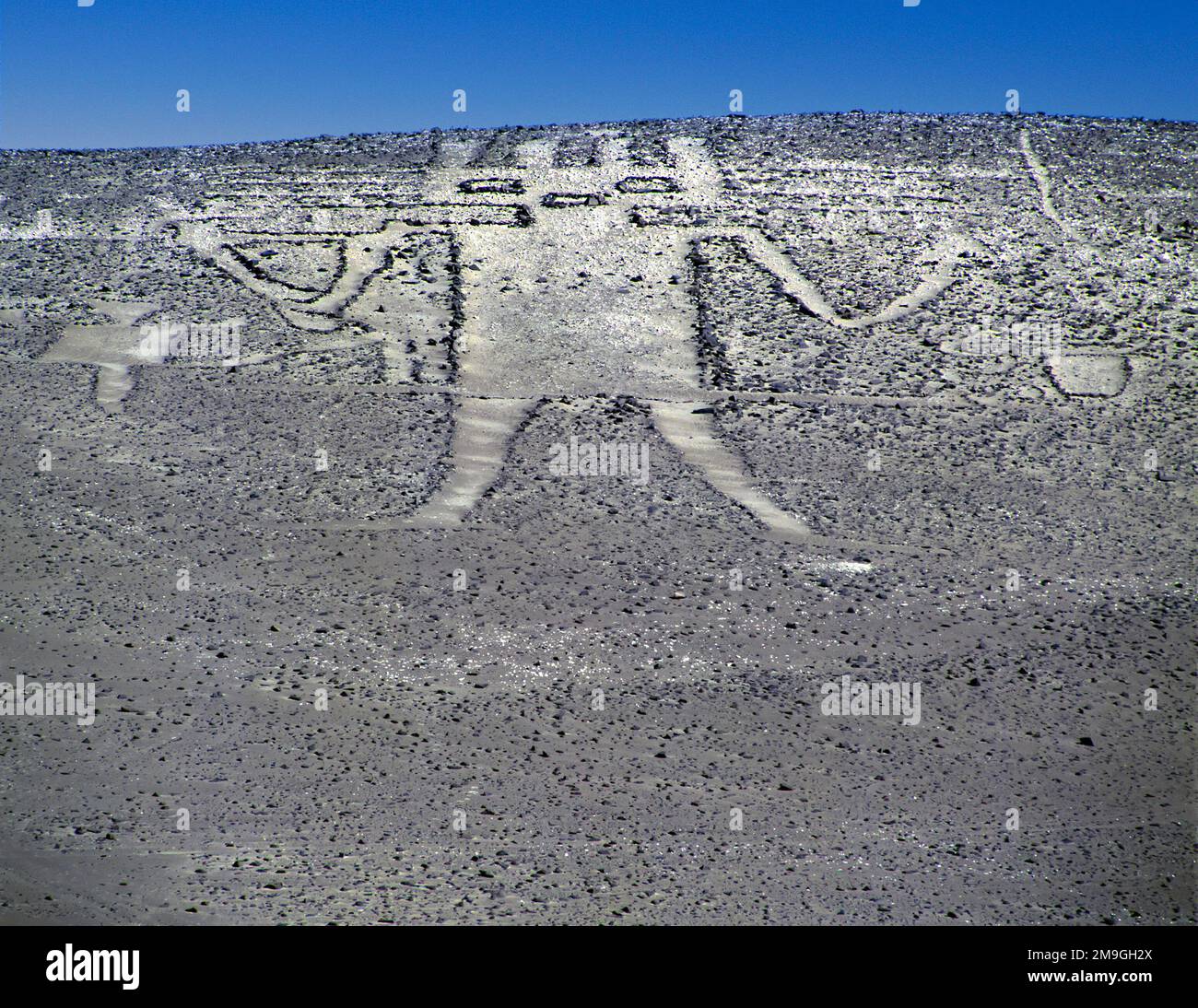 Famous Atacama Giant, Giant of Tarapacá or Geoglyph of Cerro Unita is a 119-meter long figure carrying water drawn on the slope of Cerro Unita's surfa Stock Photo