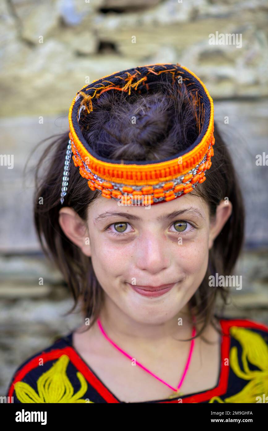 Portrait of a Kalash girl with colorful traditional headdress, Bumburet ...