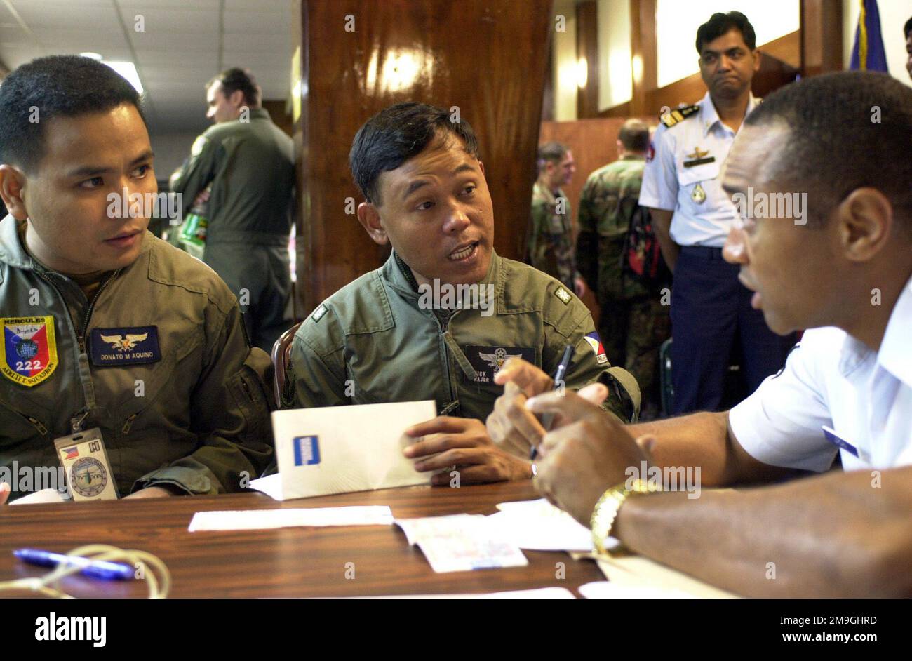 Captain Donato M. Aquino, (left), 220 Airlift Wing, Mactan Air Base
