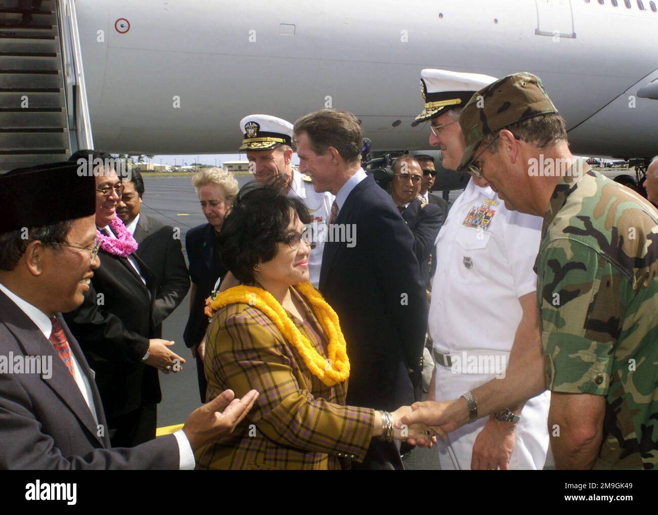 President of Indonesia, Megawati Sukarnoputri greeted by Colonel John West, 15th Air Base Wing Vice Commander, upon her arrival at Hickam Air Force Base, Hawaii. President Megawati stopped at Hickam to refuel her aircraft. She is enroute to New York to address the UN General Assembly. Base: Hickam Air Force Base State: Hawaii (HI) Country: United States Of America (USA) Scene Major Command Shown: PACAF Stock Photo