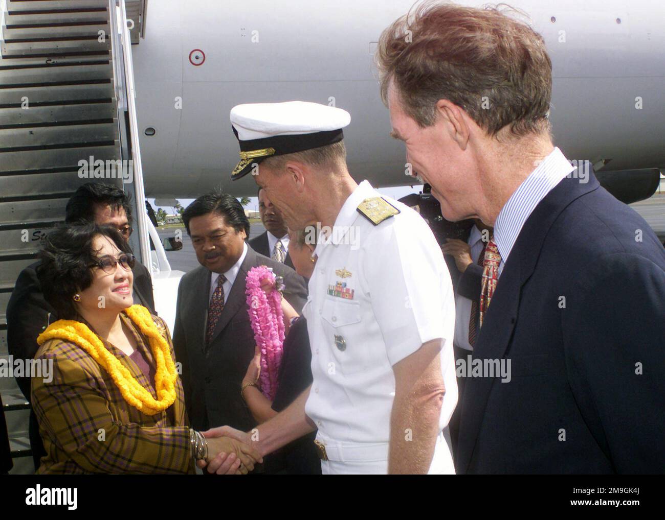 President of Indonesia, Megawati Sukarnoputri, greeted by Admiral Dennis C. Blair, US Pacific Commander in CHIEF, at her arrival at Hickam Air Force Base, Hawaii. President Megawati stopped at Hickam to refuel her aircraft. She is enroute to New York to address the UN General Assembly. Base: Hickam Air Force Base State: Hawaii (HI) Country: United States Of America (USA) Scene Major Command Shown: PACAF Stock Photo