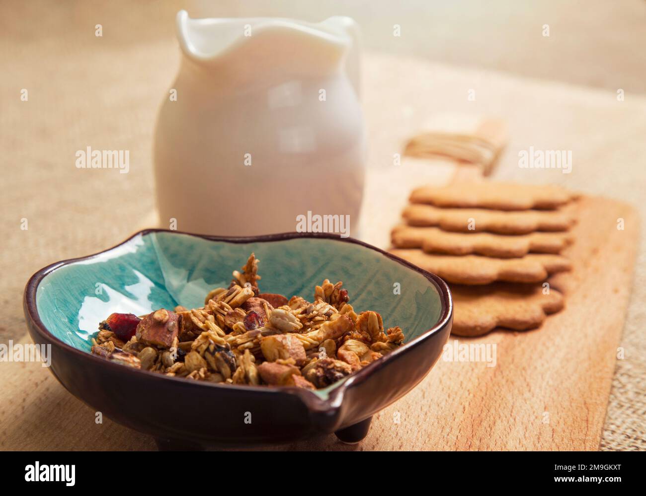 Granola with milk and gingernut Stock Photo