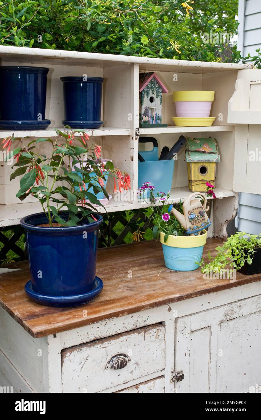 63821-20406 Potting bench with containers and flowers in spring, Marion Co. IL Stock Photo