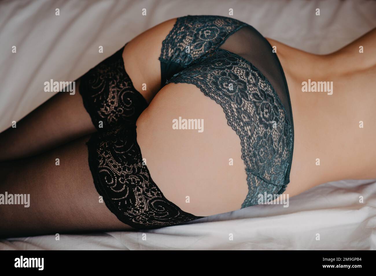 Pacific girls.com ass sexy big ass woman in beautiful panties on the bed Stock Photo - Alamy