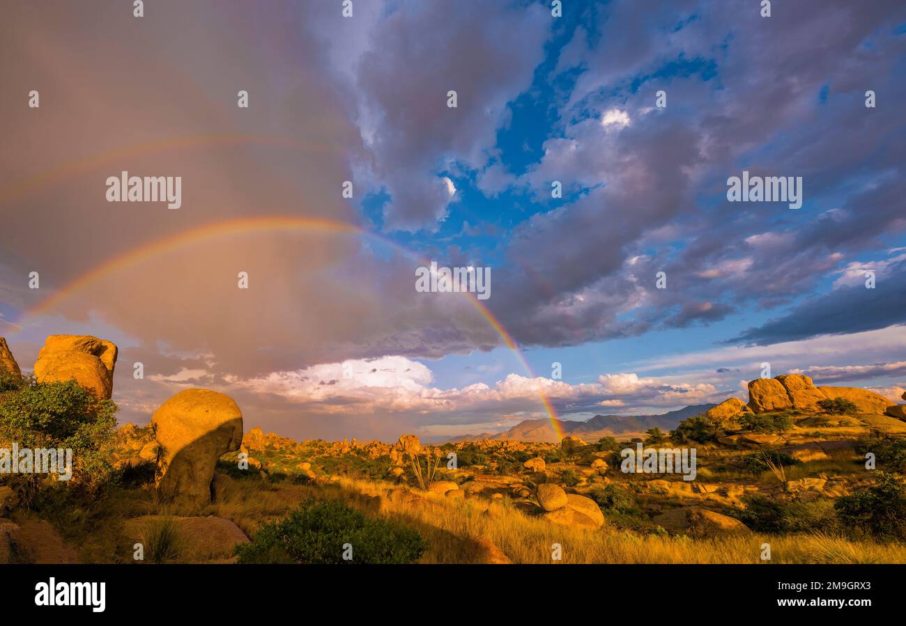 Landscape with rainbow in desert, Texas Canyon, Dragoon Mountains, Chihuahuan Desert, Arizona, USA Stock Photo