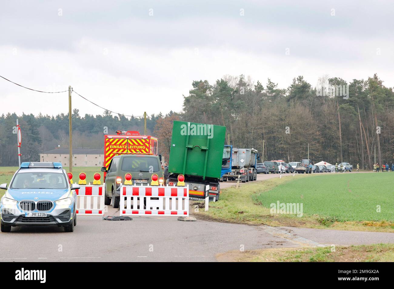 Schwandorf, Germany. 18th Jan, 2023. Due to an outbreak of avian influenza in the district of Schwandorf on a farm with around 70,000 ducks, all animals are to be culled. The police have set up a roadblock at an access road to the farm. Credit: Daniel Löb/dpa/Alamy Live News Stock Photo