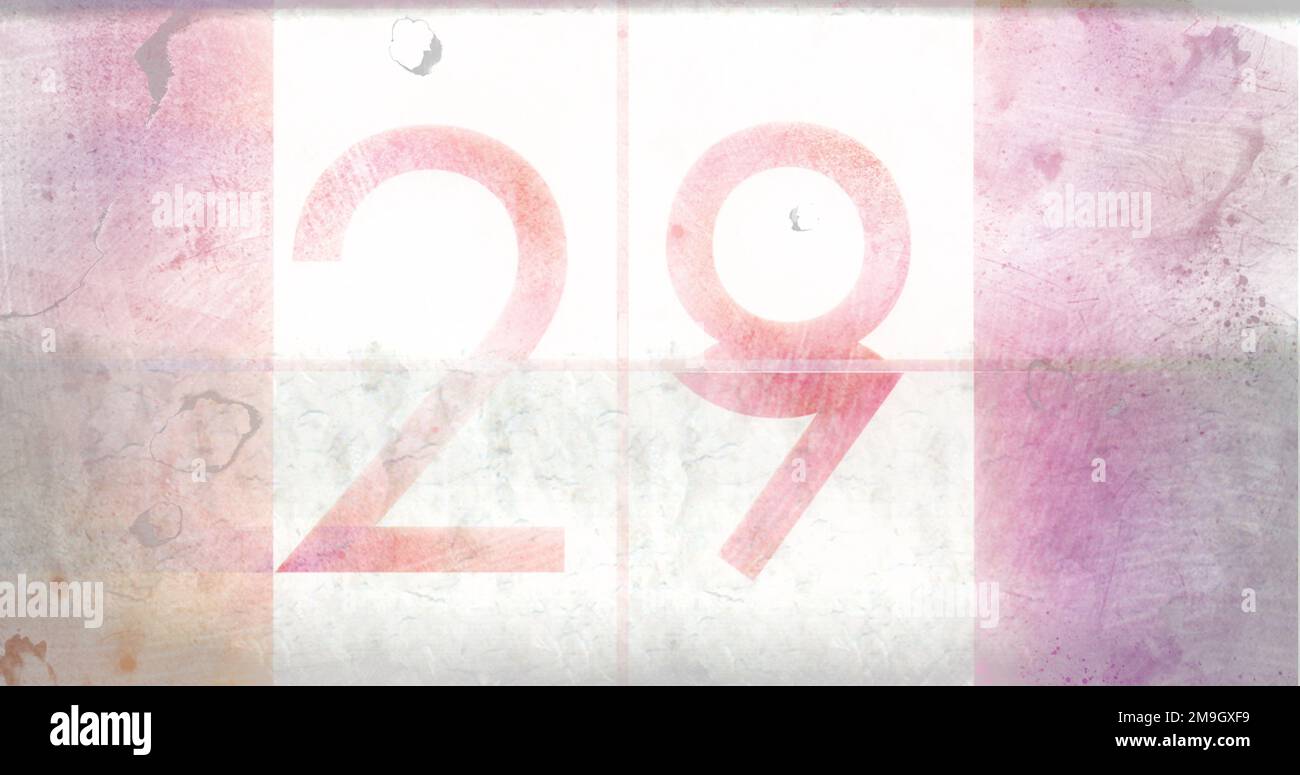 Image of number 29 on pink distressed background Stock Photo