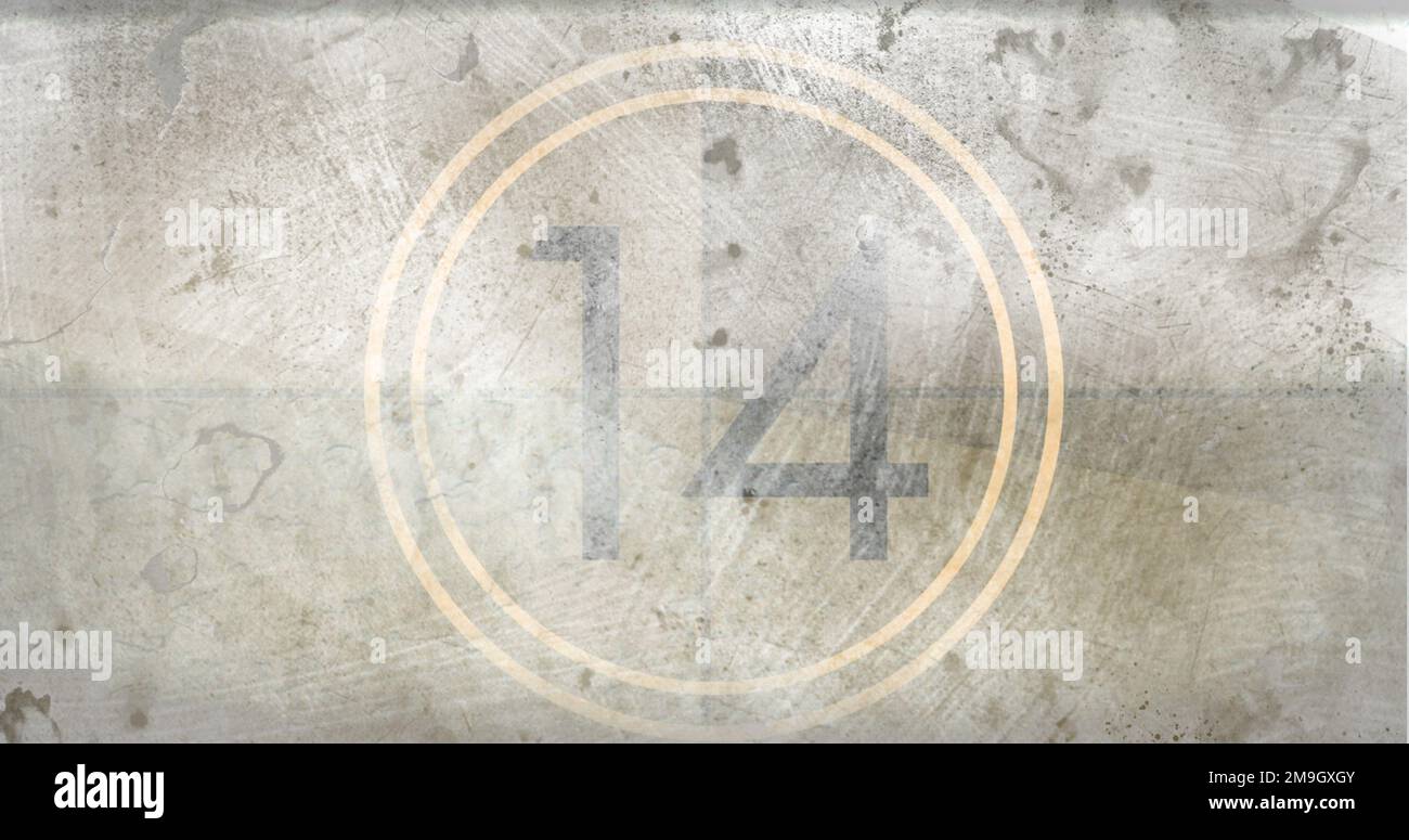 Image of number 14 in circle on grey distressed background Stock Photo