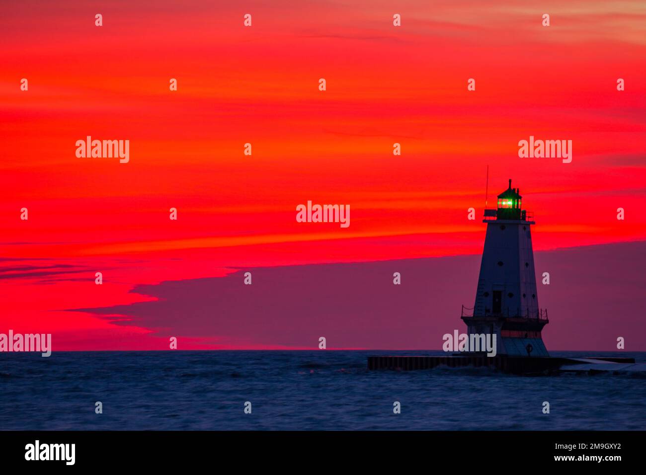 64795-01019 Ludington North Pierhead Lighthouse at sunset on Lake Michigan, Mason County, Ludington, MI Stock Photo