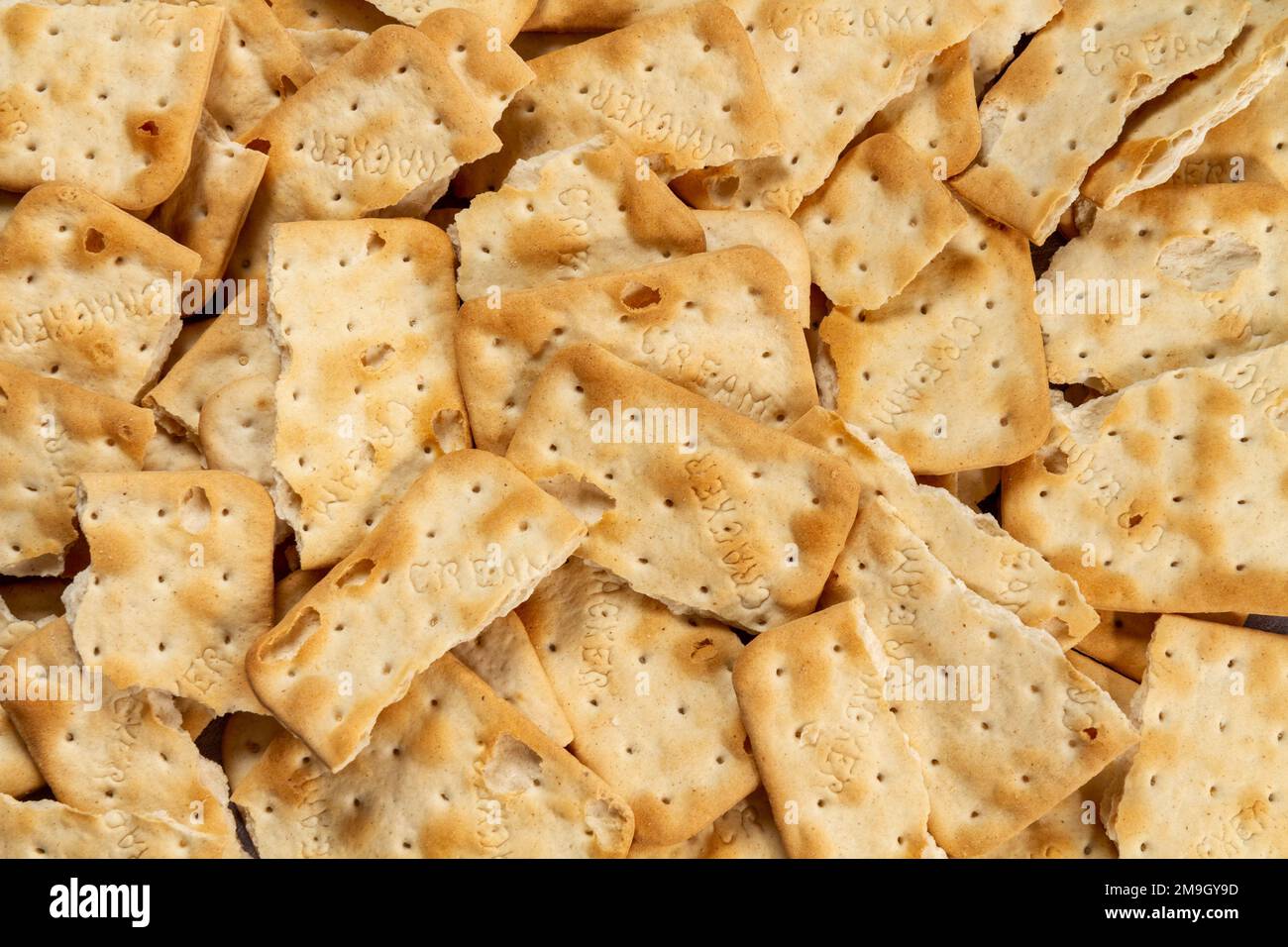 broken cream crackers Stock Photo Alamy