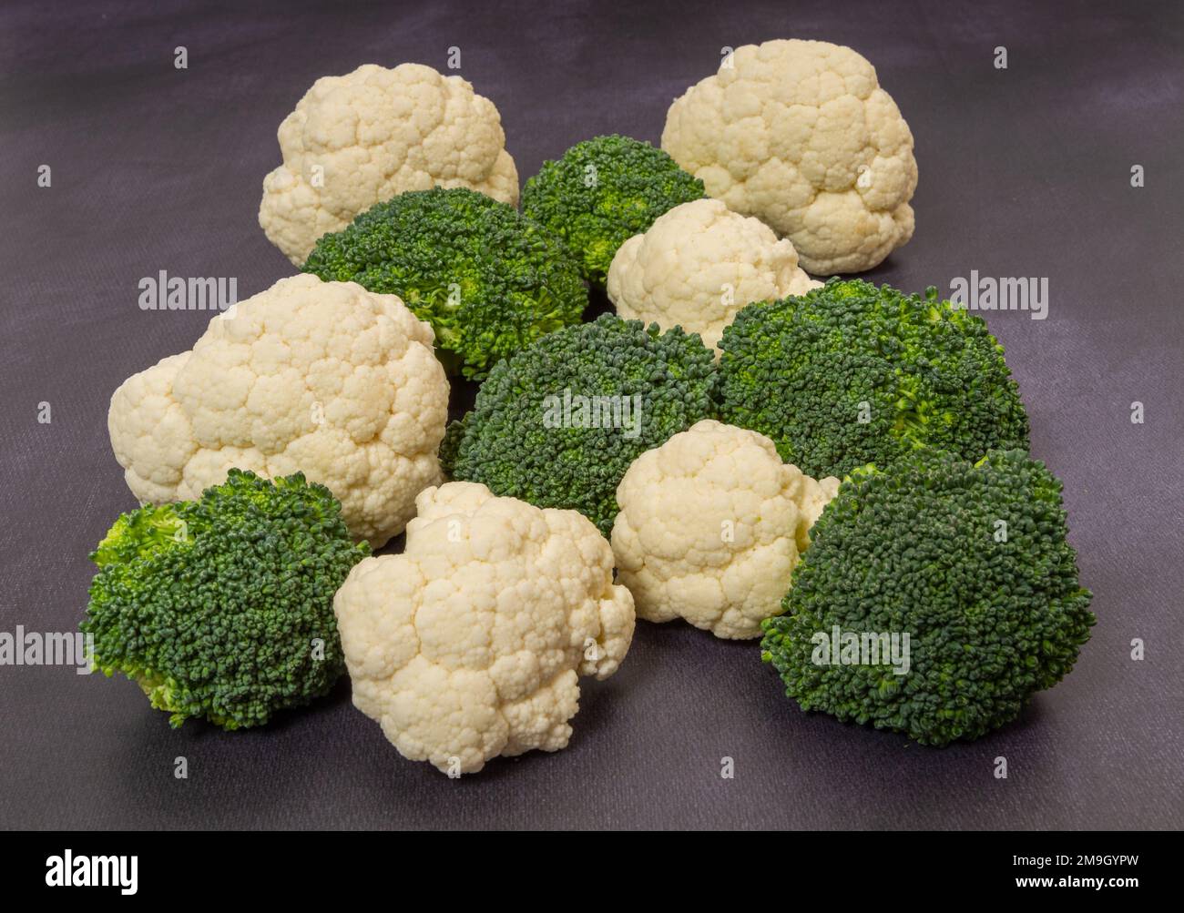 cauliflower and broccoli florets together Stock Photo Alamy