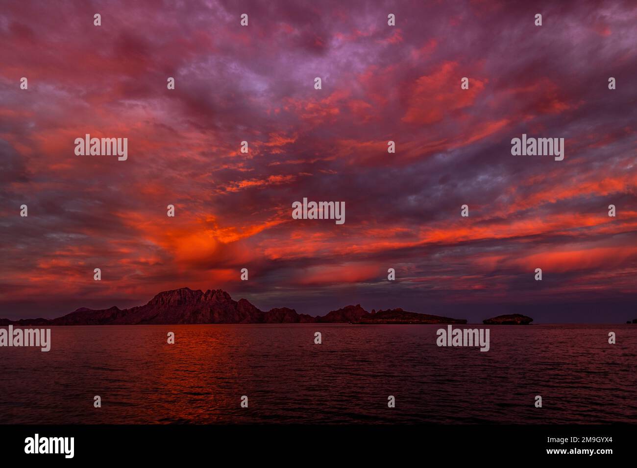 Danzante Island and Gulf of California at sunset, Baja California Sur, Mexico Stock Photo