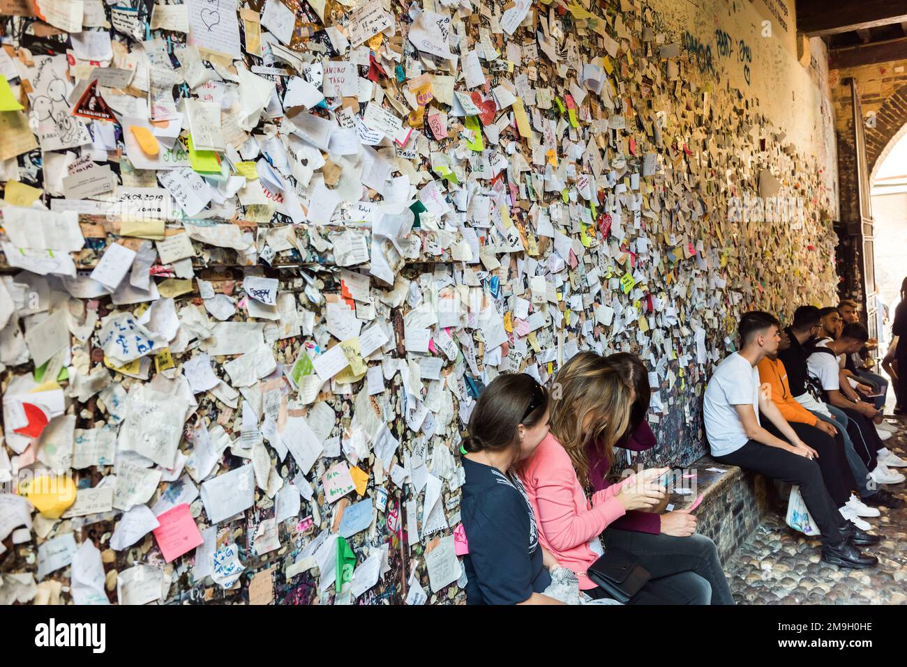 VERONA, ITALY - SEPTEMBER 26, 2019: Love letters at a wall of Juliet's House (Casa di Giulietta) in Verona. Popular place for tourists. Stock Photo