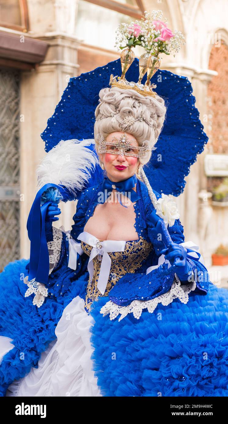 VENICE, ITALY - SEPTEMBER 24, 2019: Carnival of Venice (Carnevale di  Venezia). Beautiful girl preparing with blue costume and mask for Venice  Mask Car Stock Photo - Alamy