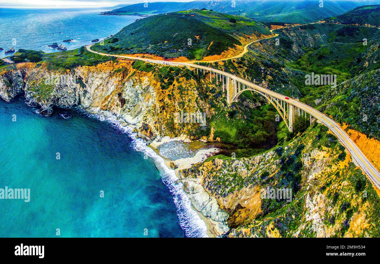 Aerial view of Bixby Creek Bridge along Pacific Ocean coastline, Big ...